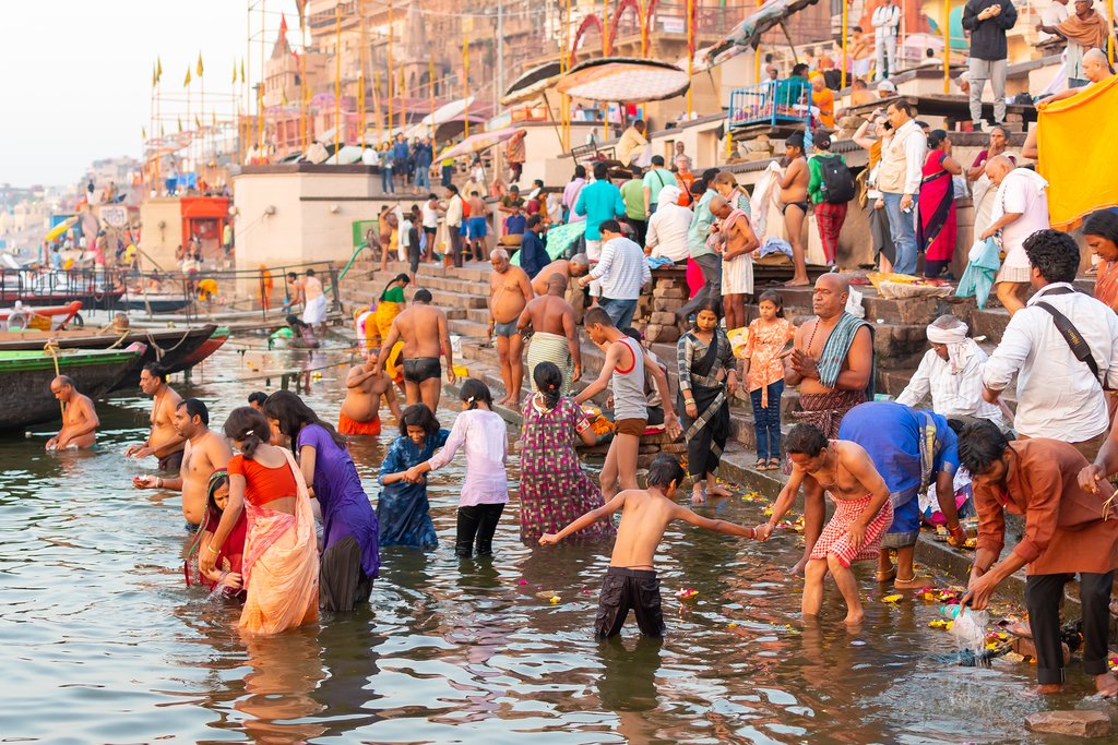 Watch the Hindu Pilgrims bathe in the holy waters of the Ganges