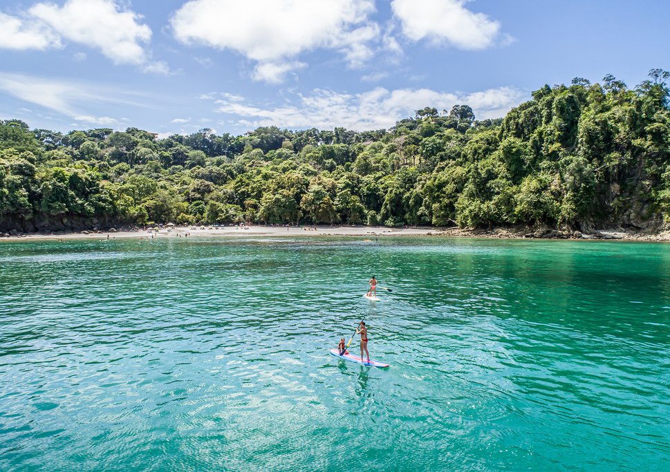 Swim, paddle, or snorkel in the pristine waters off Manuel Antonio National Park