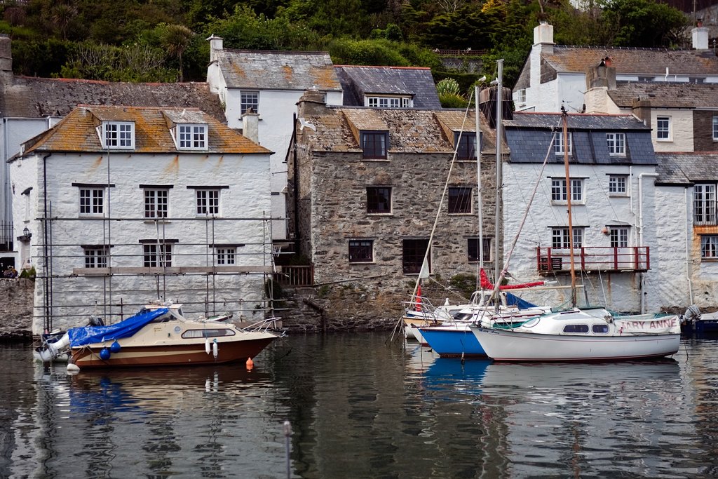 Historic fishing cottages along Plymouth's harbor.