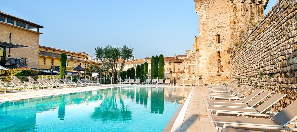 Spend the day relaxing poolside in your hotel