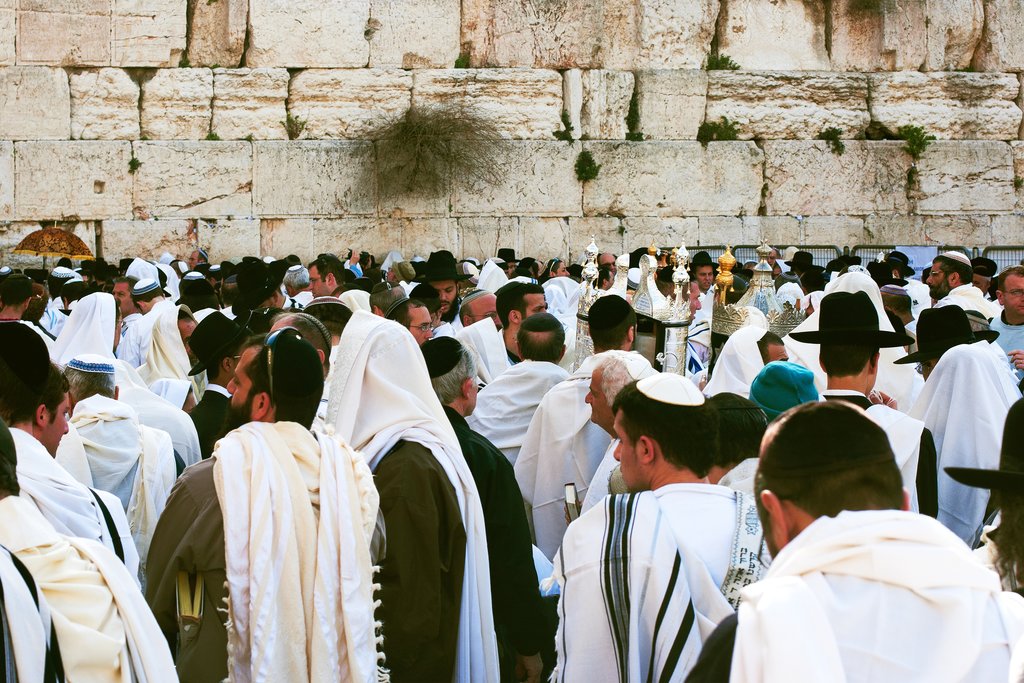 Men praying by the Western Wall