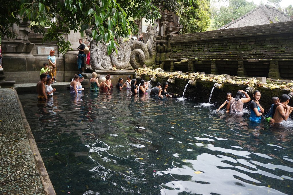 You can bathe in holy water at Tirta Empul Temple