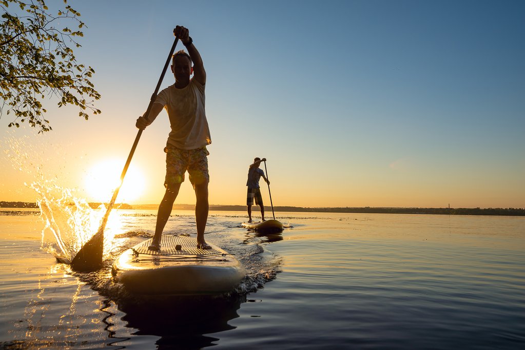 Try some stand-up paddle boarding