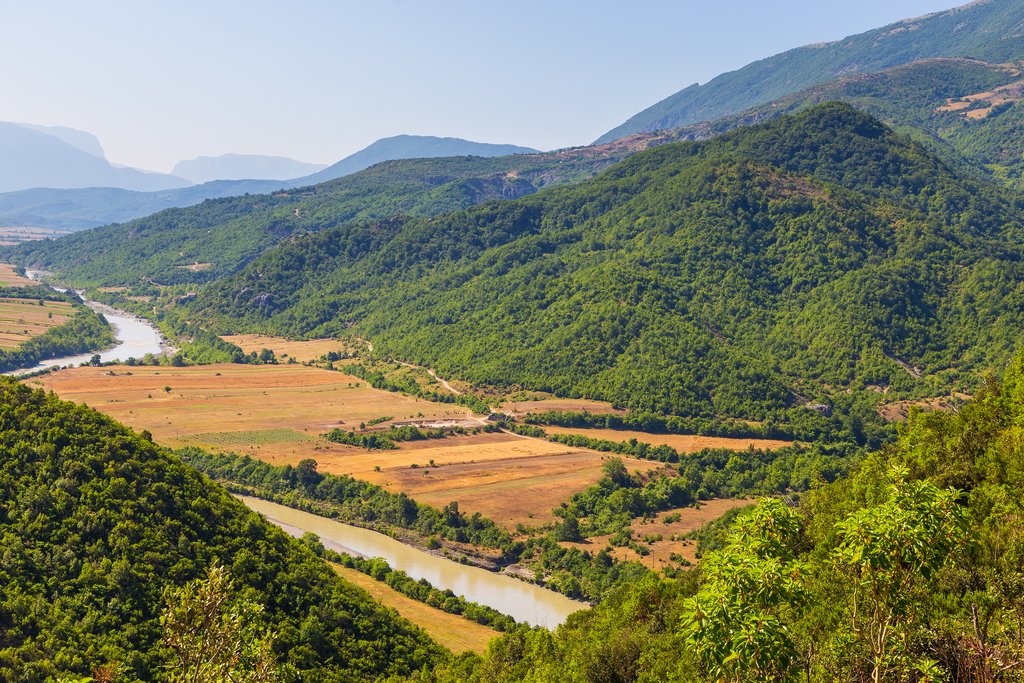 Farmland in a valley in the Leskovik region