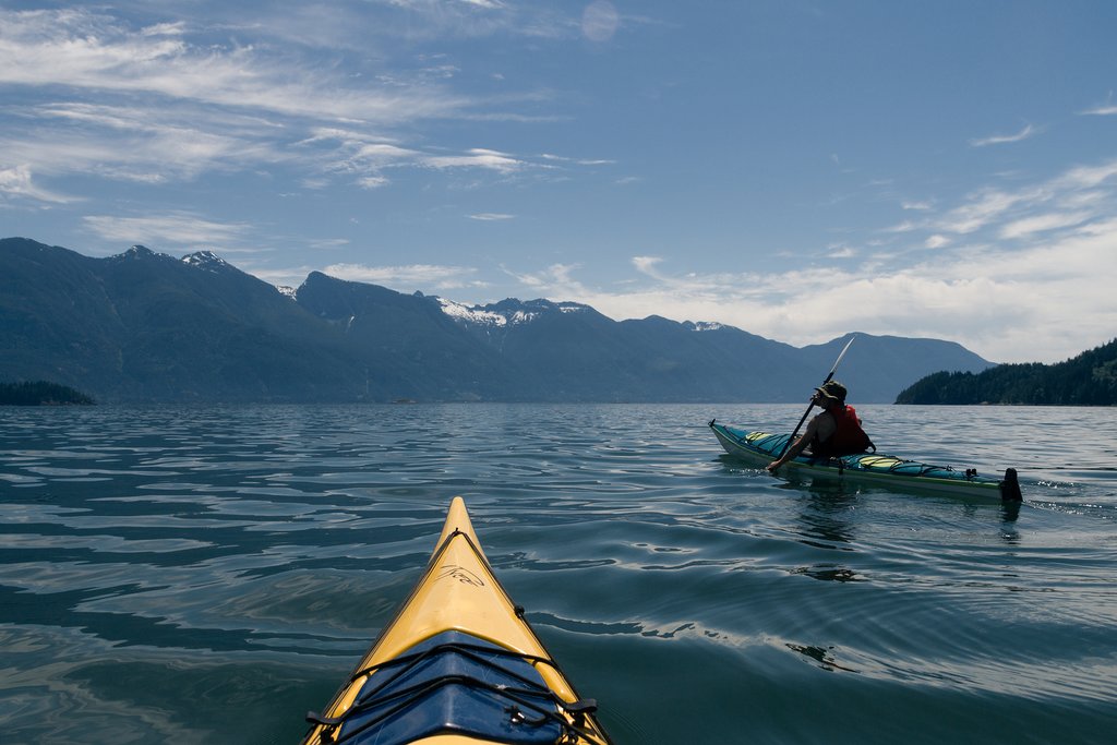 Lone kayaker paddles off Vancouver Island's western shore