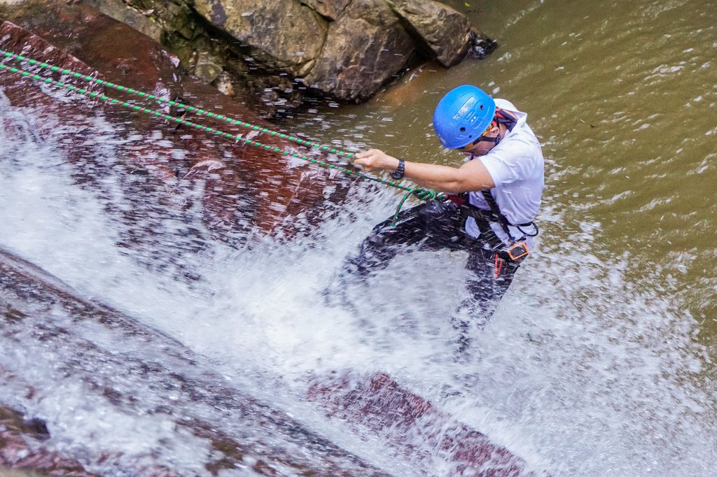 Maybe try rappelling down a watefall
