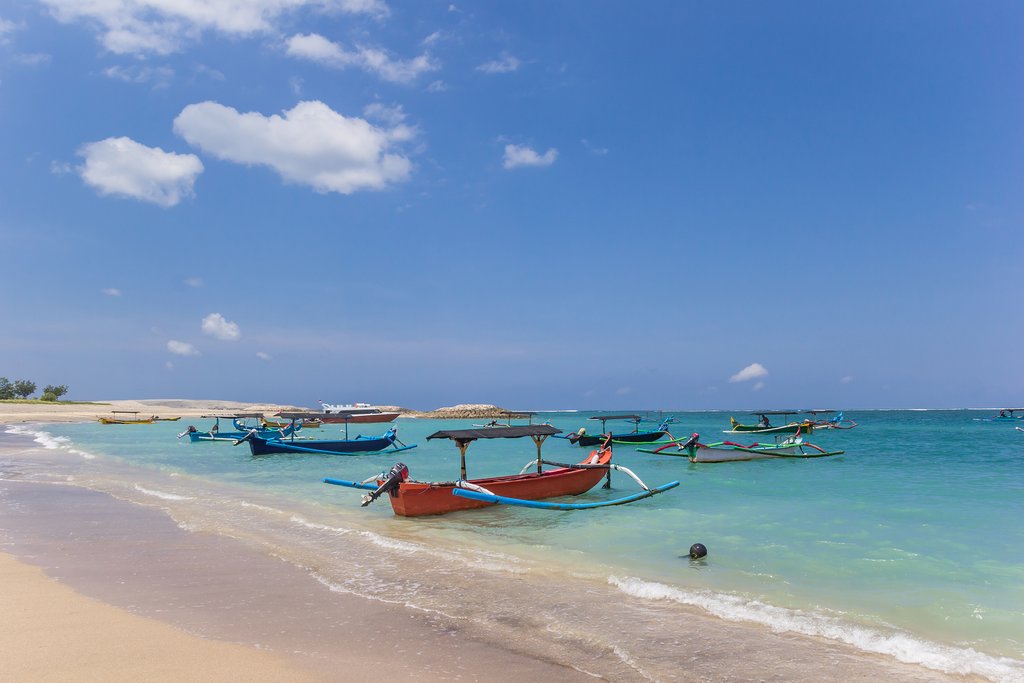 Spend the afternoon relaxing on the beach in Seminyak