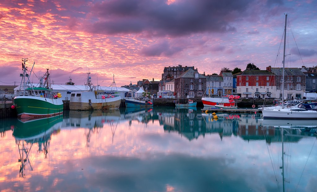 Sunrise over Padstow's harbor.