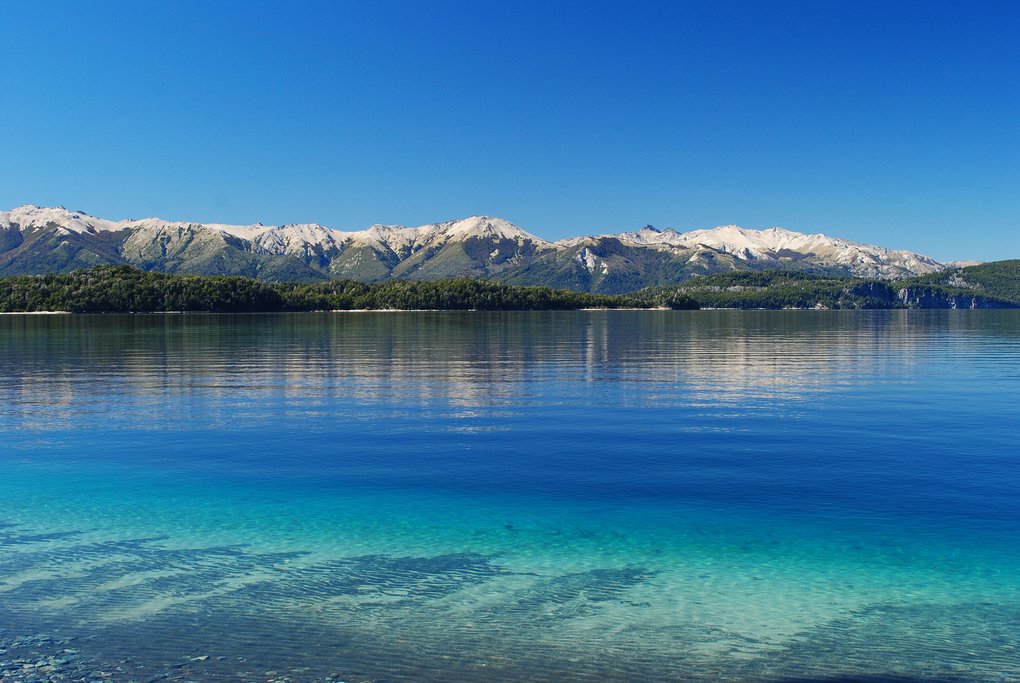 Take a boat ride on the vivid blue waters of Lago Nahuel Huapi