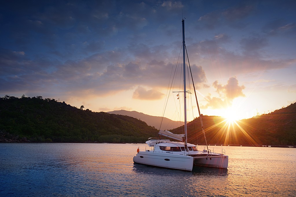 Enjoy the sunset aboard a luxury catamaran