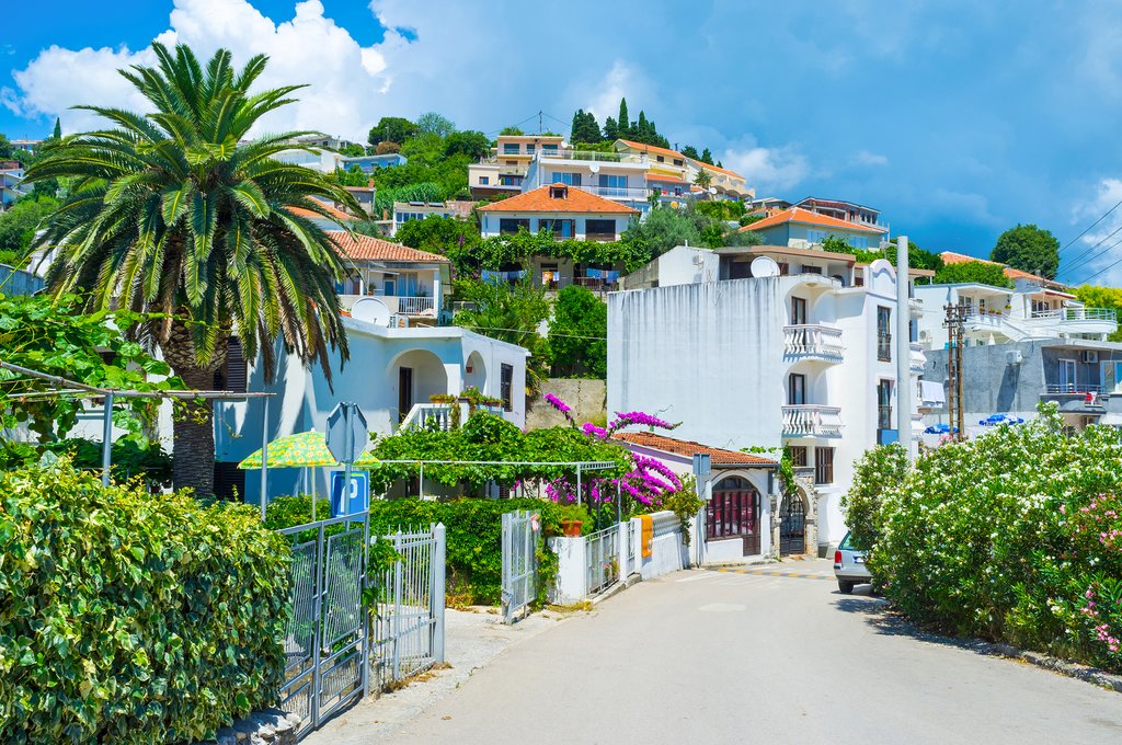 hilly street with tiny gardens surrounding the cottages and hotels Ulcinj Montenegro