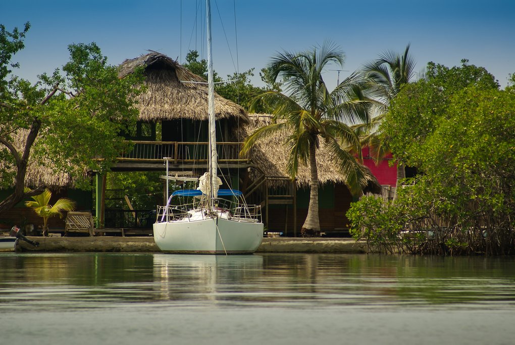 Arrive on the island of Mucura by boat