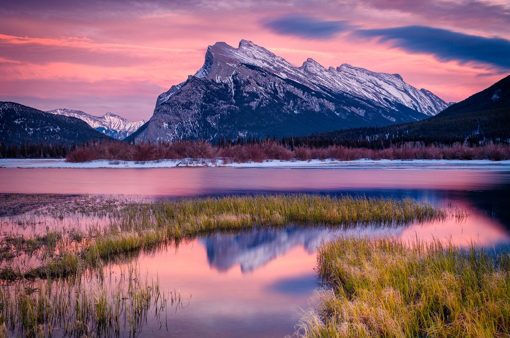Evening reflection of Mount Rundle in Vermilion Lakes