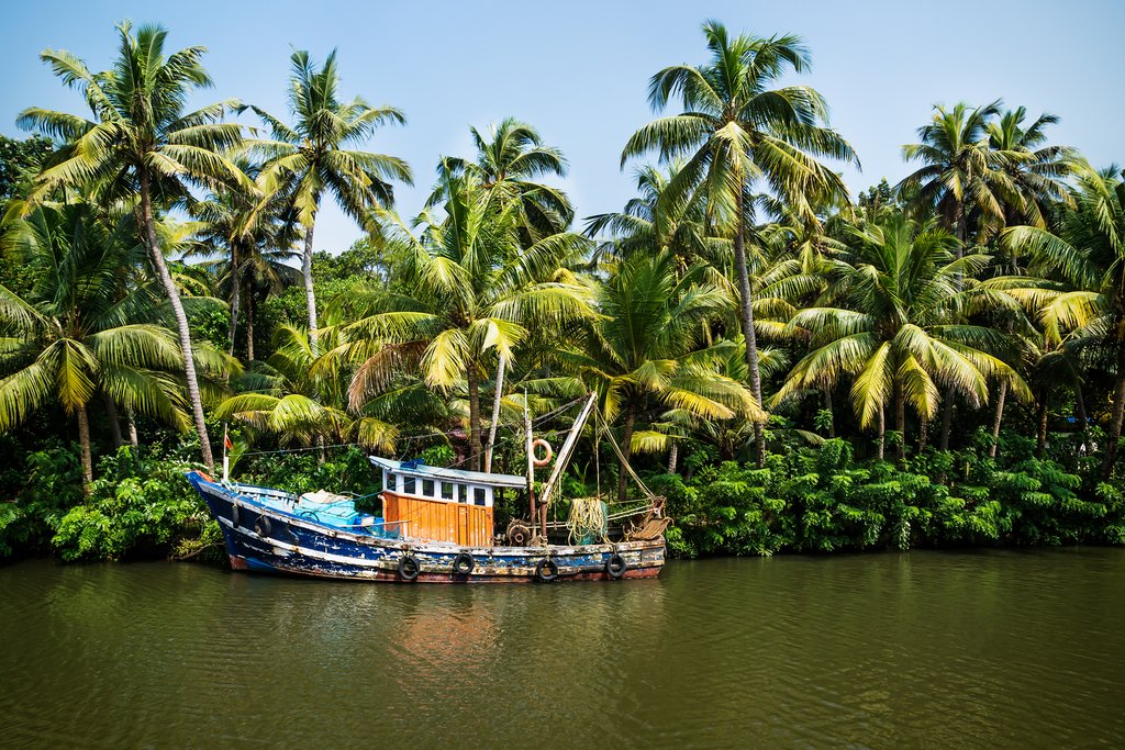 An old ocean fishing boat in the Kerala backwaters