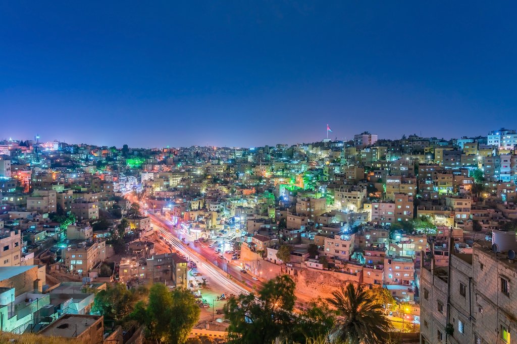 A view of Amman's city lights at dusk
