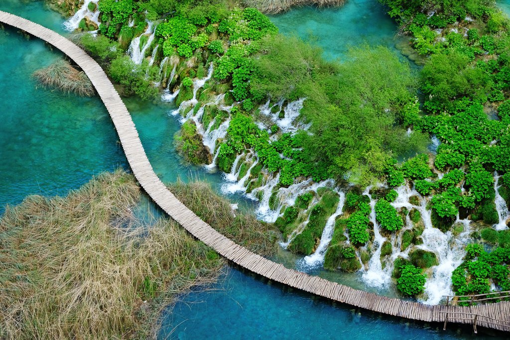 Croatia - Plitvice Lakes - Aerial view over Plitvice Lakes National Park and winding boardwalk