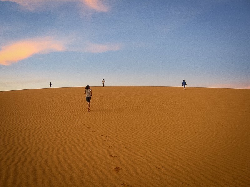 Explore the sand dunes by foot.