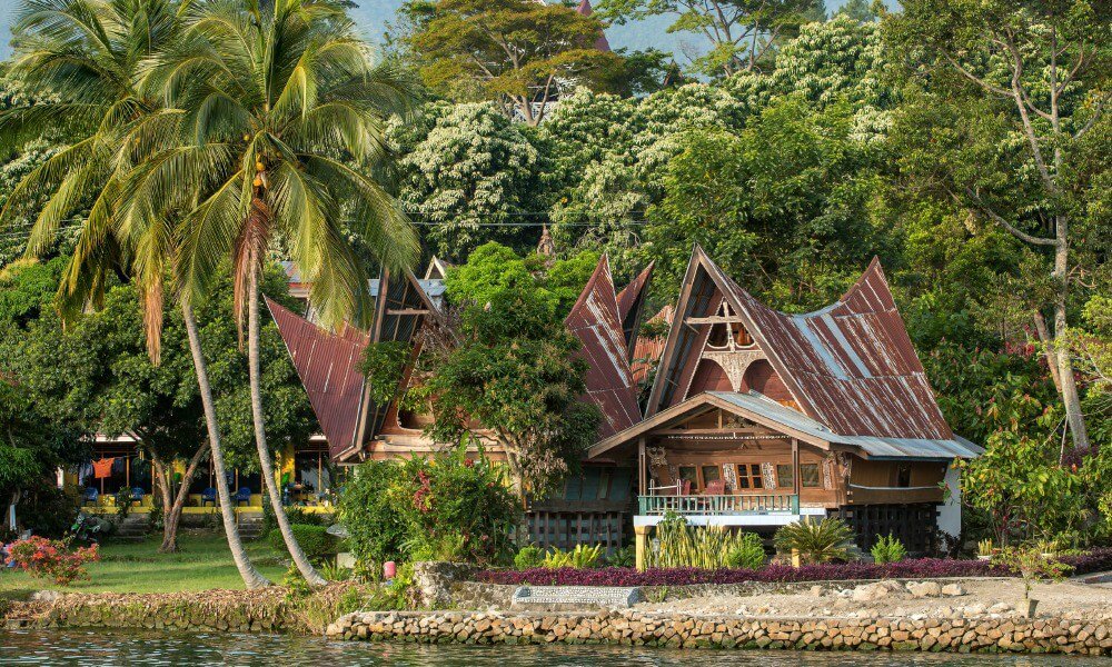 Traditional Batak architecture on the banks of the Bohorok River