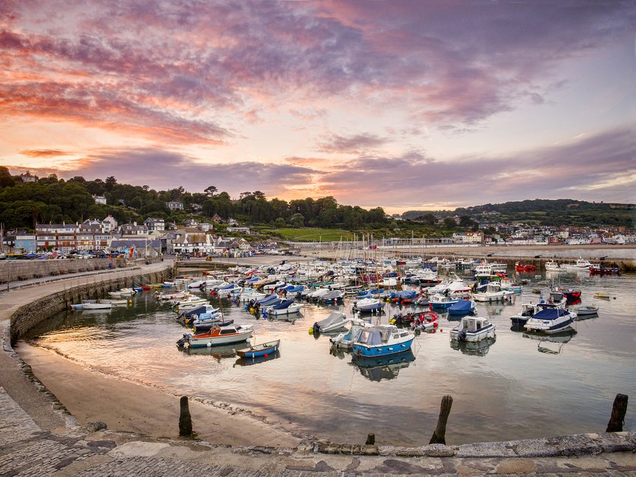 Sunset over Lyme Regis Harbor.