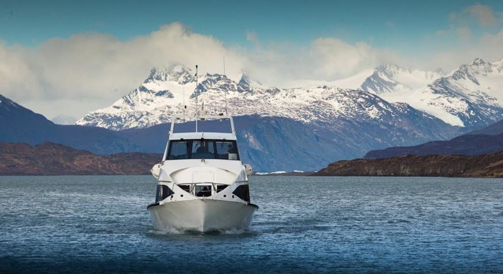 Take a boat tour by the glacier