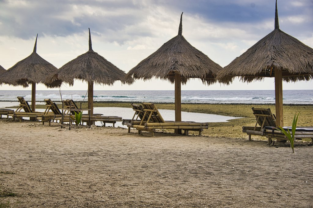 Beach loungers on a beach in Gili Air