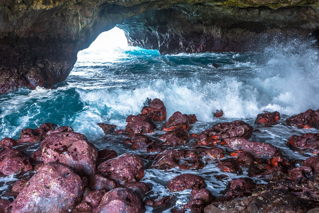 The island shelters many natural swimming pools, as well as this magnificent cave
