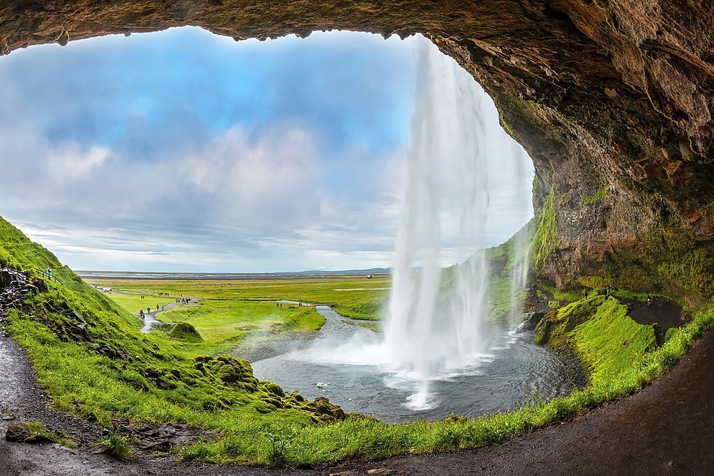 A view of Seljalandsfoss from behind the waterfall