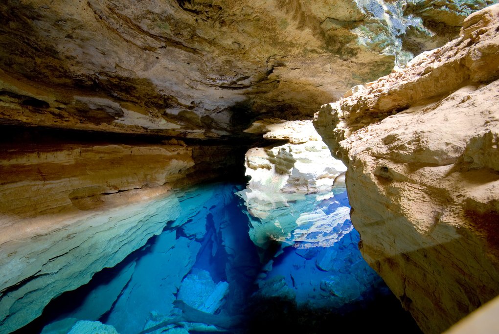 Cave with deep blue water in the park