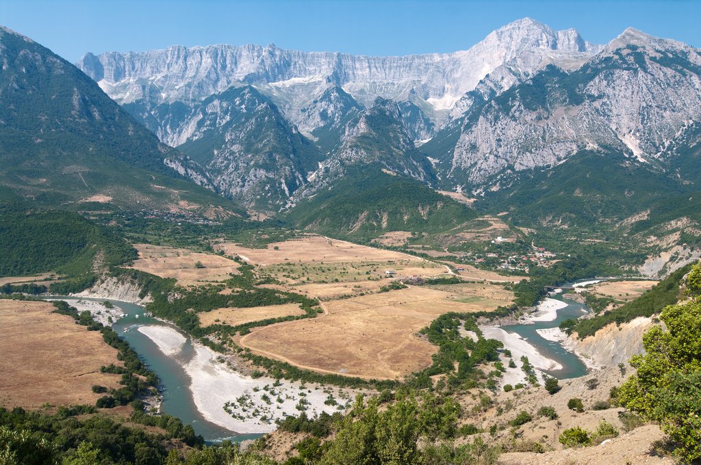 A bend in the Vjosa river and mountains in the Permet district
