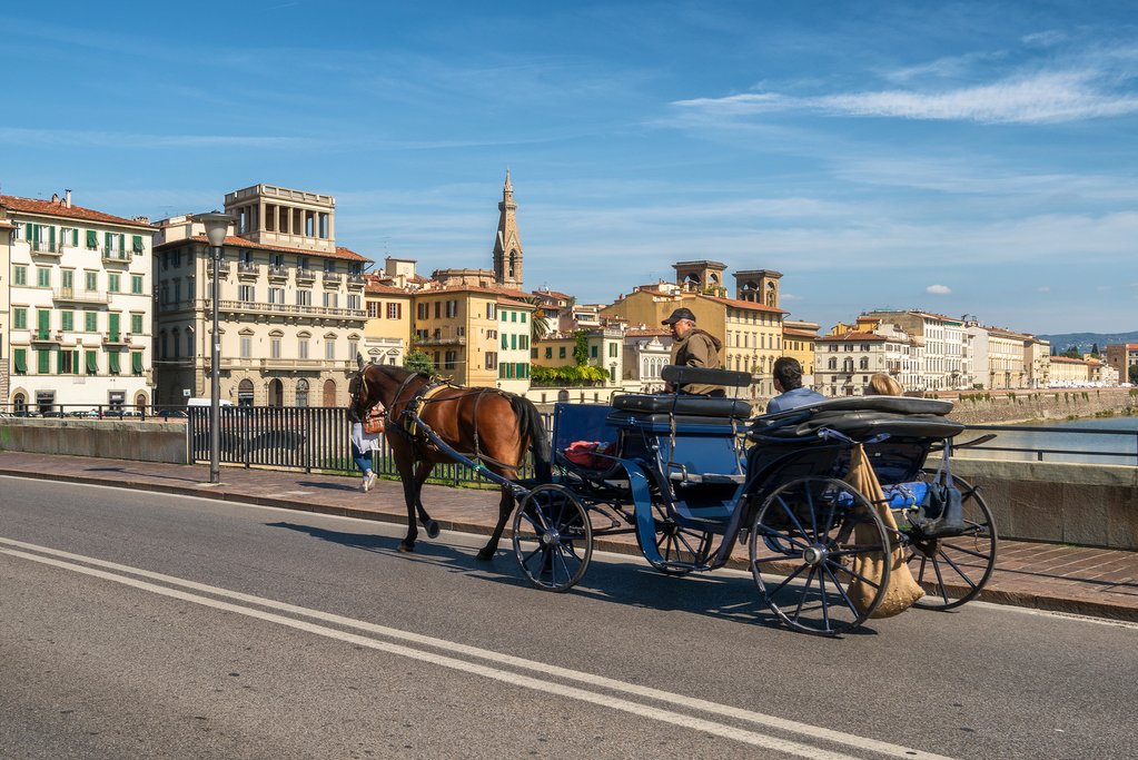 Touring Florence in a horse-drawn carriage