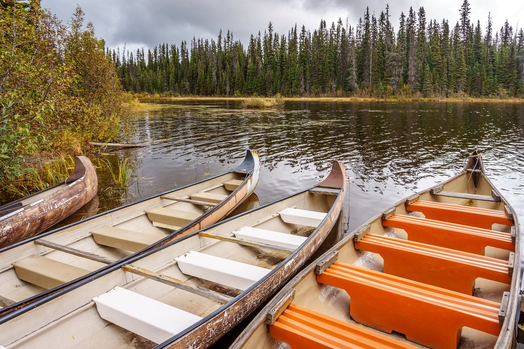 Canoes moored in McGillivray Lake in the Shuswap Highlands