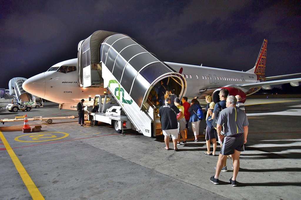 A plane getting ready for departure from Denpasar airport
