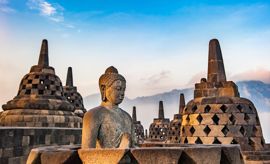 Wander around the iconic stupas at Borobudur