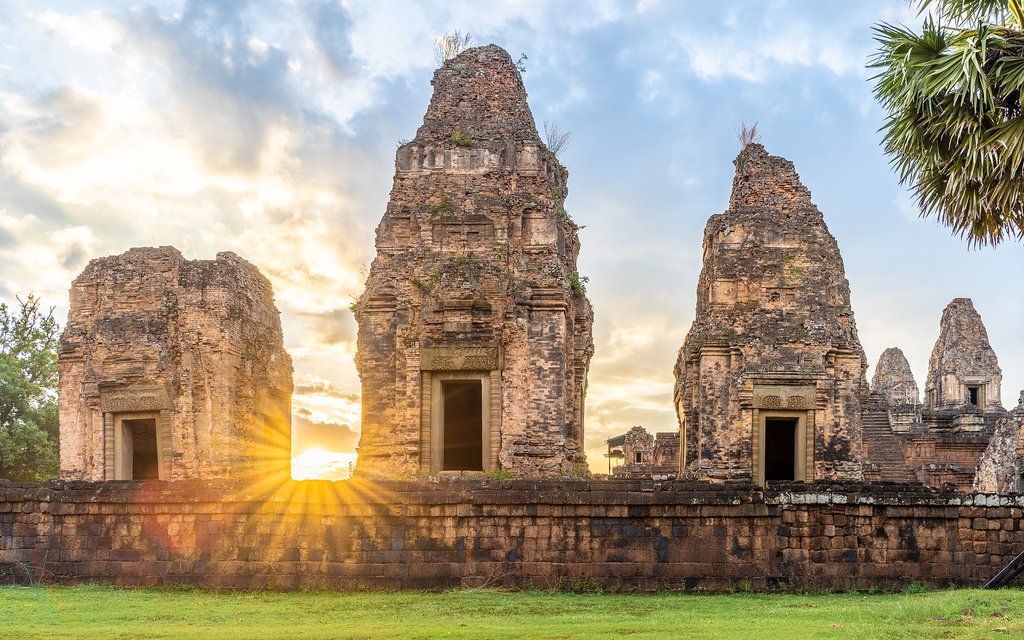 Watch the sun rise and set over the ancient temples of Angkor