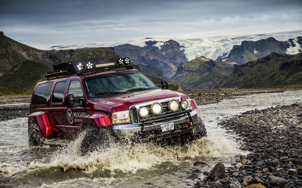 Cross rugged terrain in a Super Jeep