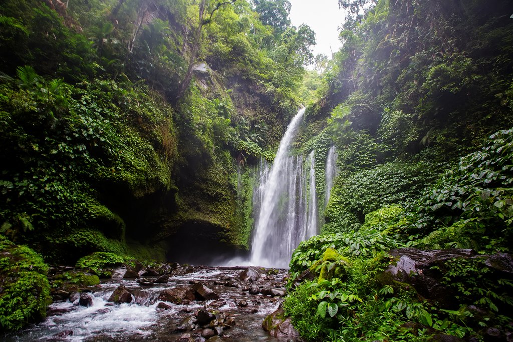Take a short hike through the jungle to Sendang Gile waterfall