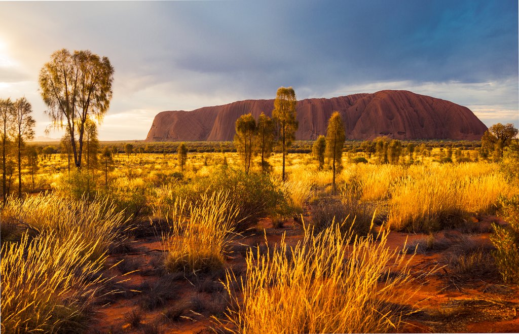 Watch the sun set over Uluru, the iconic red rock