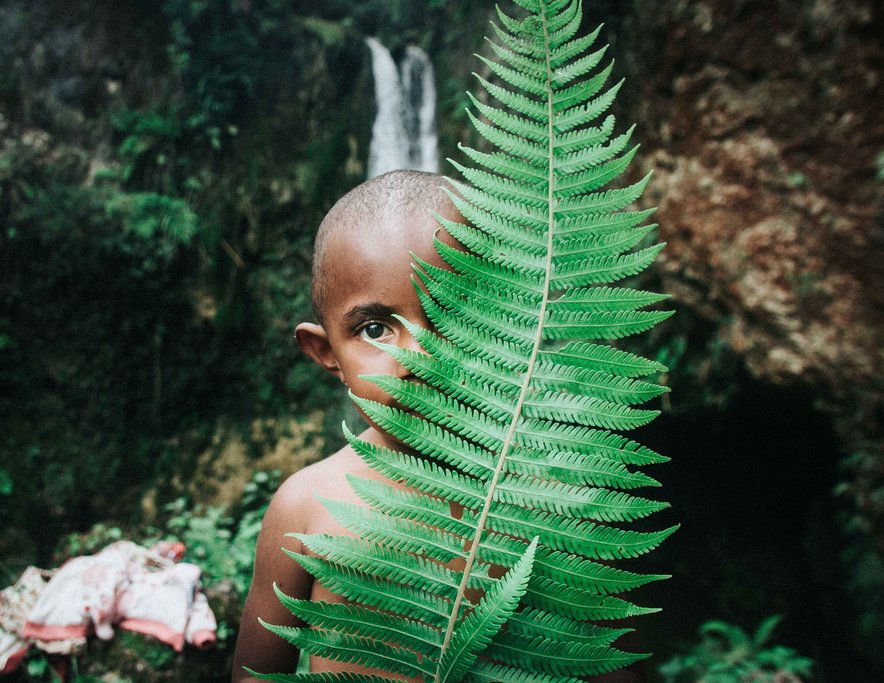 A little boy welcomes you to Papua