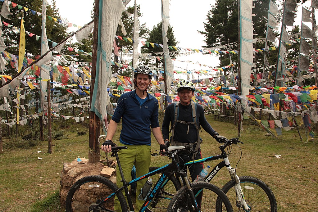 A pair of travelers biking to Paro