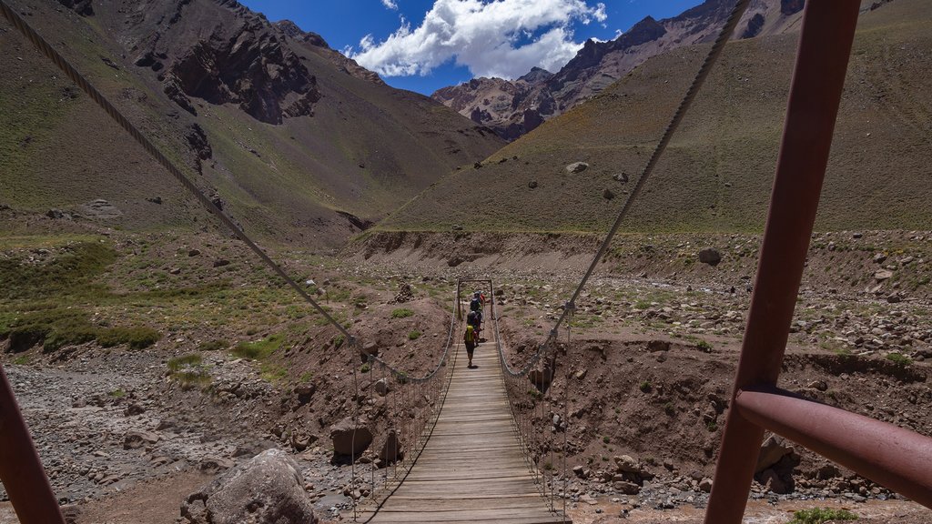Crossing a suspension bridge in the Aconcagua Provincial Park