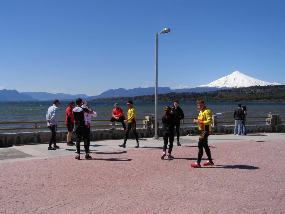 A group of bikers stops for photos on the waterfront of Pucón