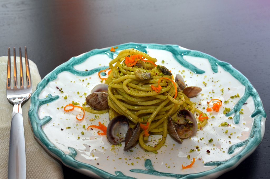 Spaghetti with seafood and pistachios, a typical Sicilian dish