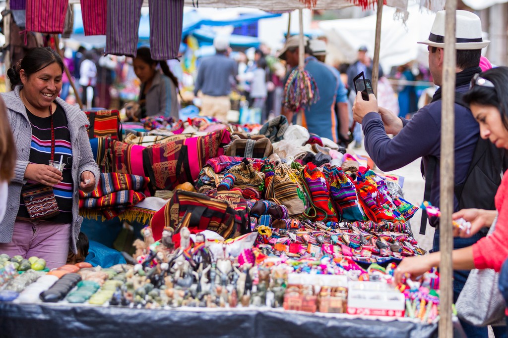 Shopping at the traditional Pisca Market is an experience of colors, textures, and sounds