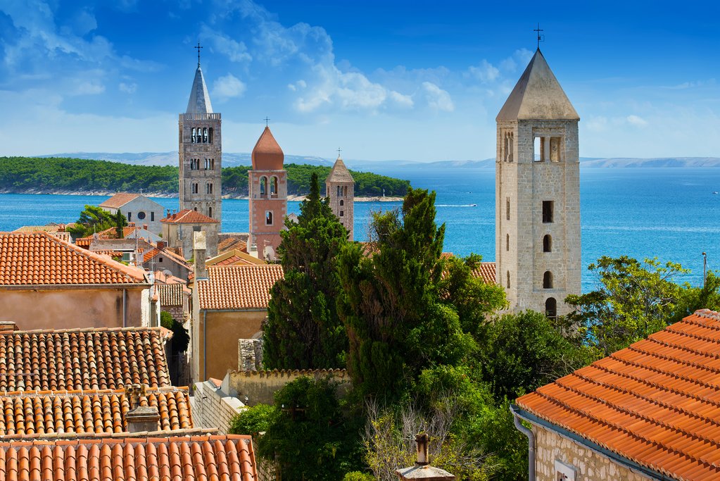 A quartet of bell towers outline Rab Town