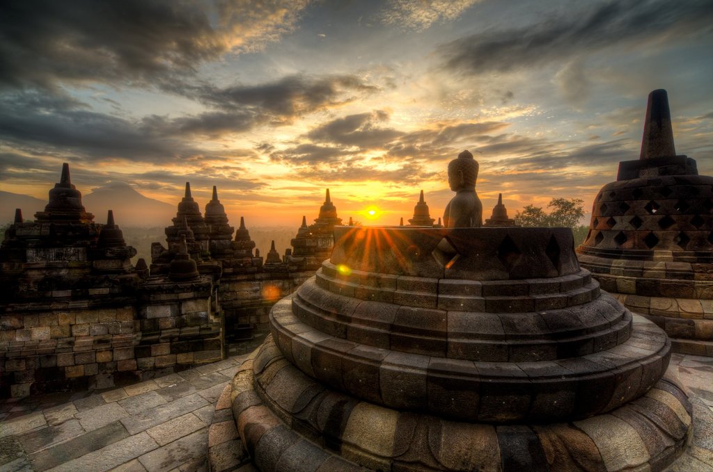 Sun is peeking through Borobudur temple