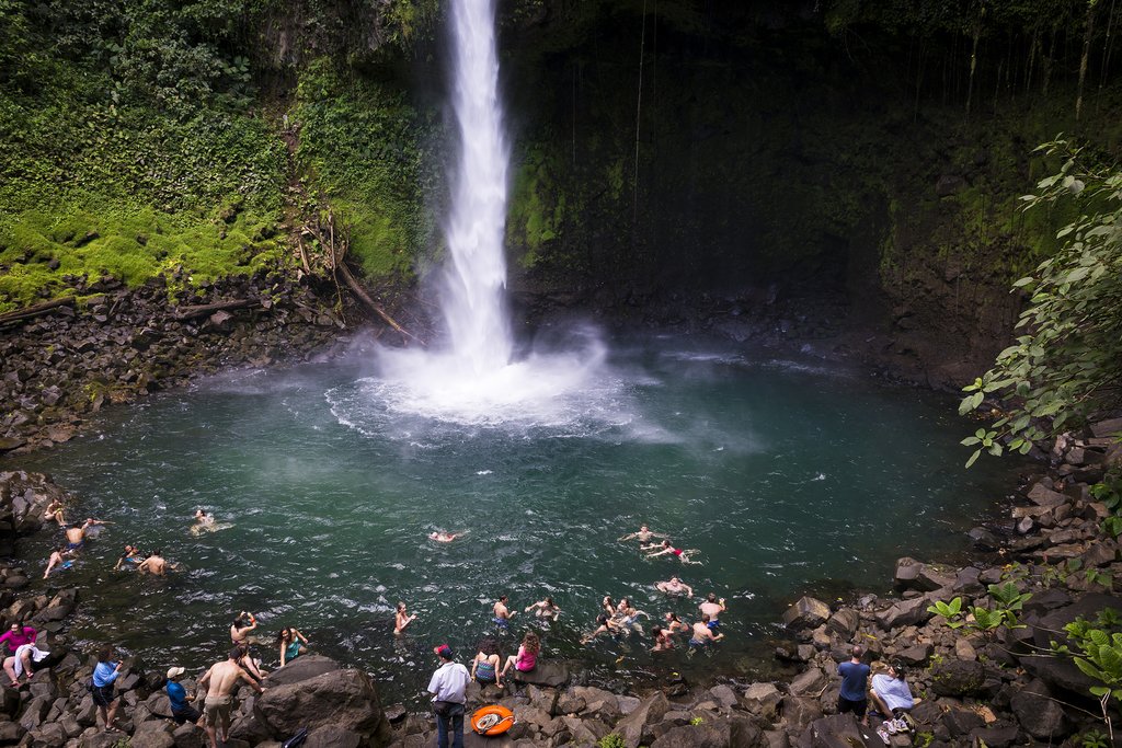 Taking a dip at the base of La Fortuna Waterfall