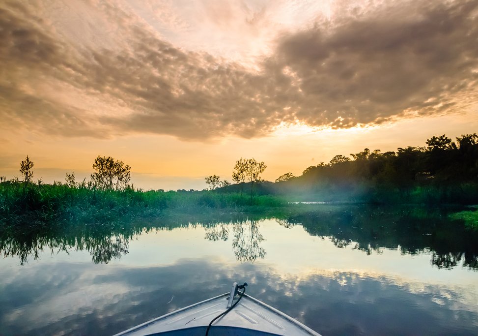 Take a boat excursion in the Amazon River.