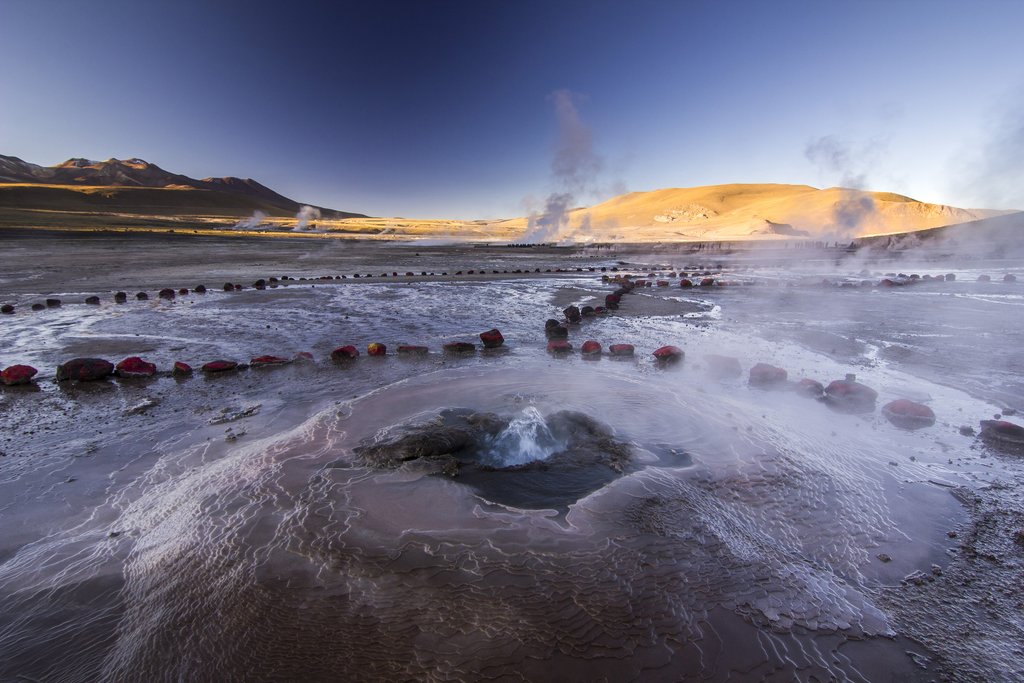 Geyser field at sunrise