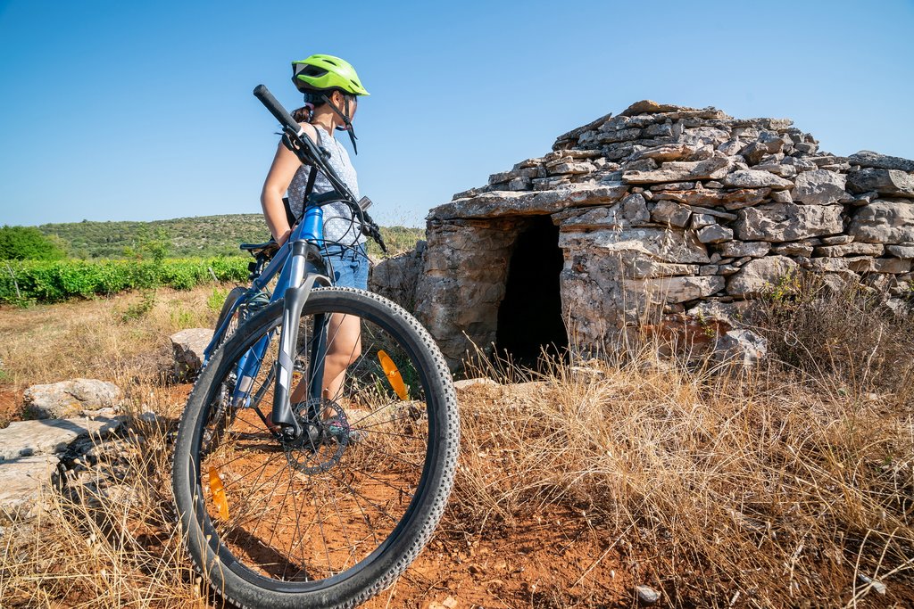 Croatia - Hvar - Cyclist explore plains around Stari Grad