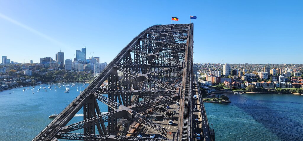 Take a dazzling climb across the Sydne Harbour Bridge at sunset